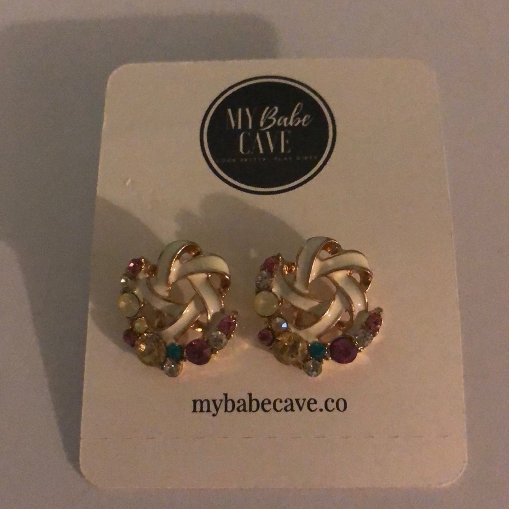 New my babe cave earrings